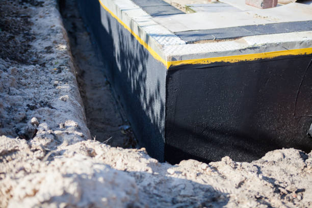 Professional Waterproofing technician working in Kouts, IN